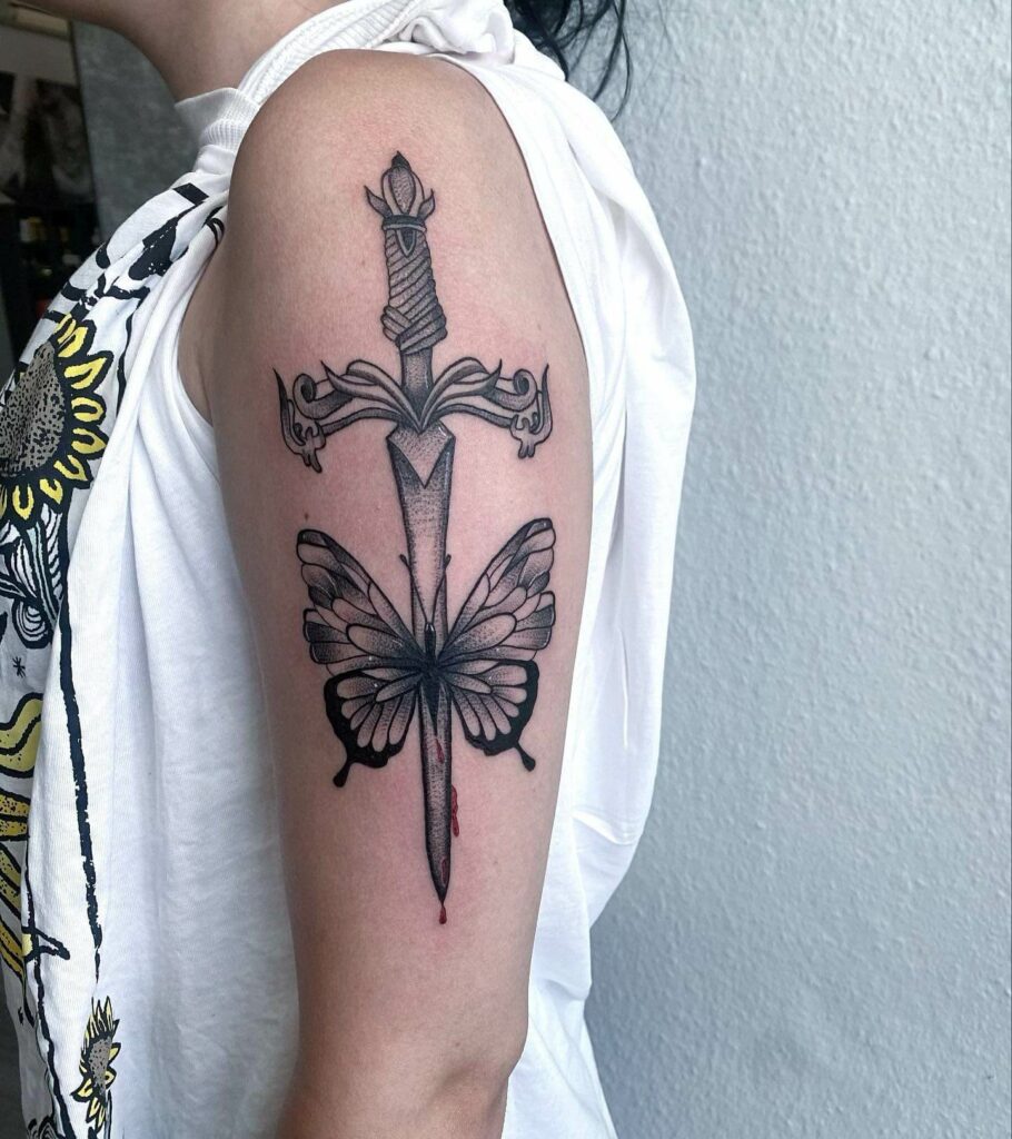 11+ Butterfly Half-Sleeve Tattoo Ideas That Will Blow Your Mind! 12 Dagger Butterfly Tattoo