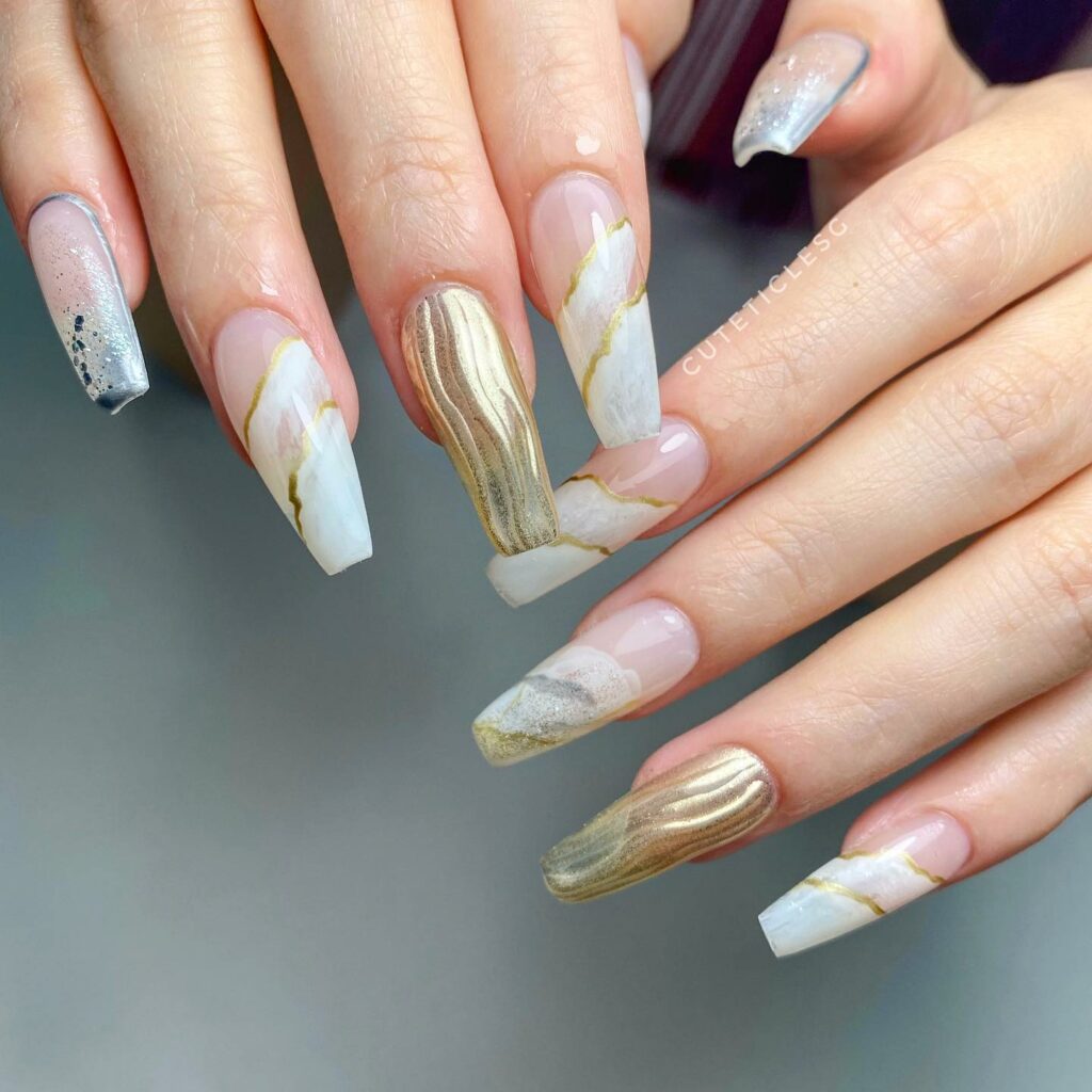 Embrace Elegance with 15 White Marble Nail Designs in 2024 15 White And Gold Marble Nails