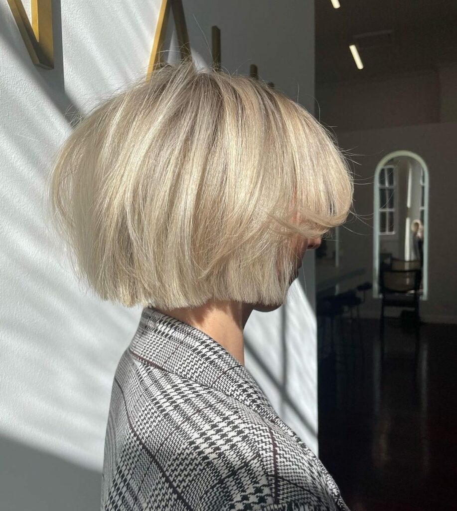 25 Short Layered Haircut Ideas to Revamp Your Look in 2024 30 Straight Textured Creamy Blonde Bob
