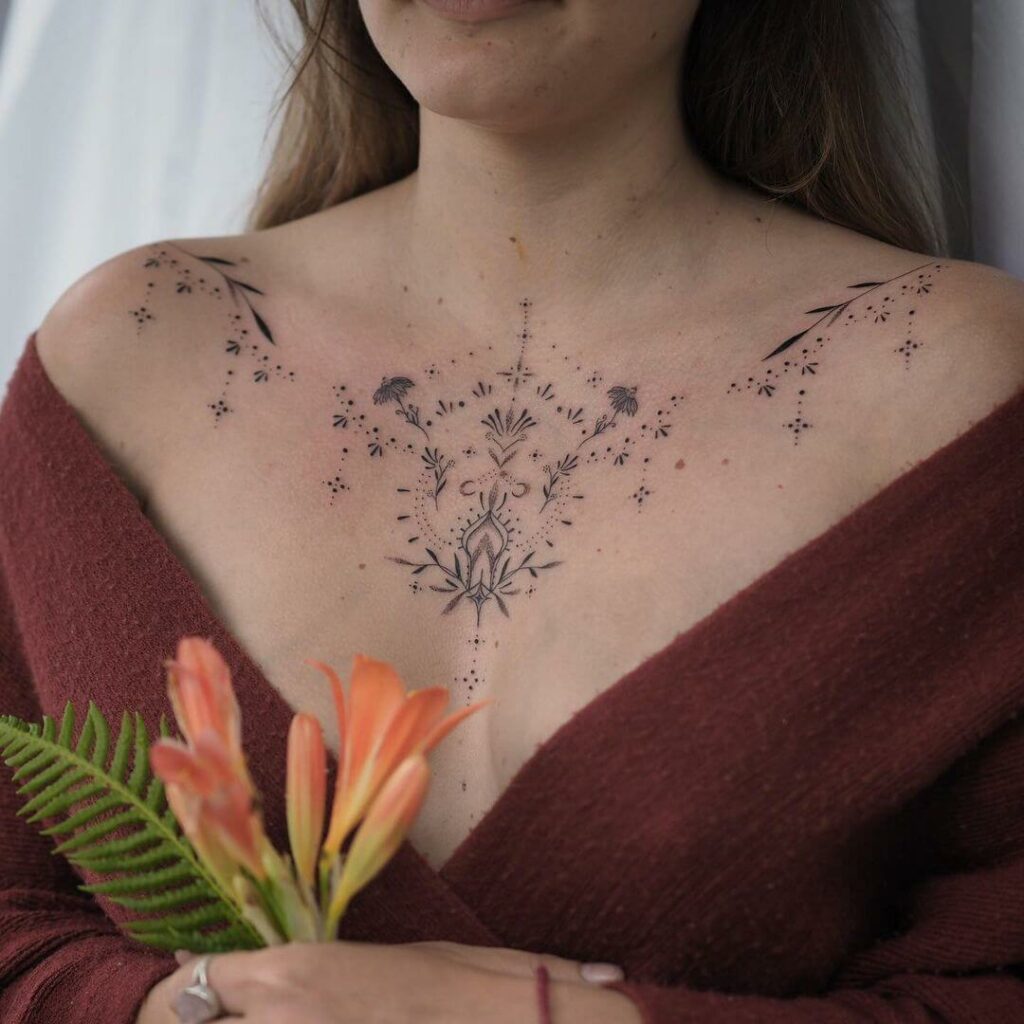11+ Pretty Tattoo Ideas That Will Blow Your Mind! 13 Delicate Ornamental Chest Tattoos for Women in Black Ink