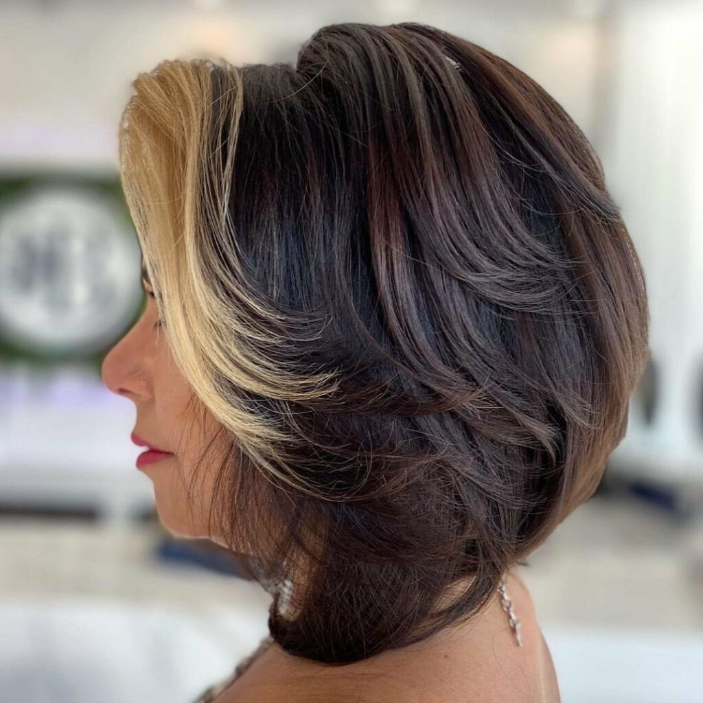 25 Short Layered Haircut Ideas to Revamp Your Look in 2024 27 Springy Chin Bob
