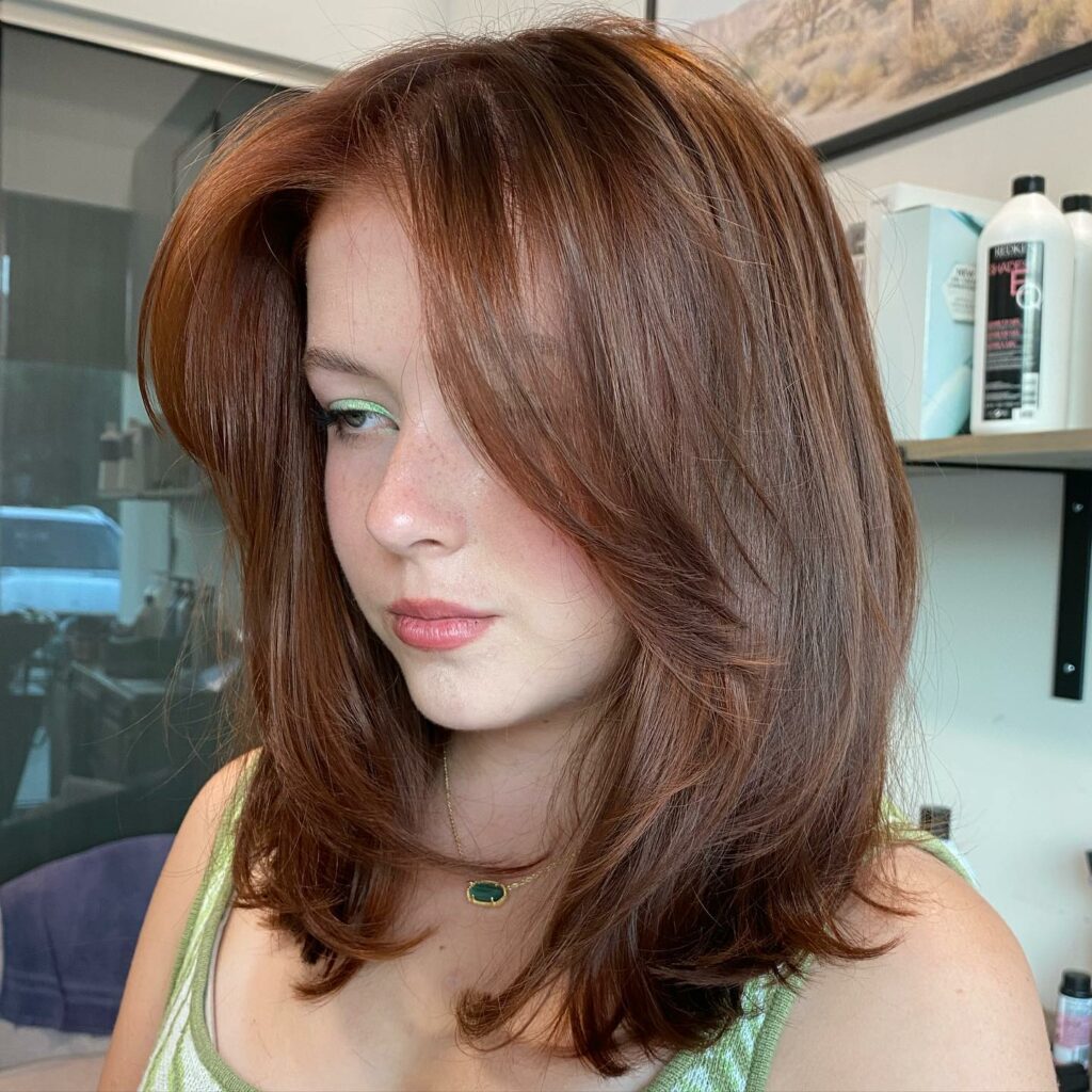 25 Long Layers With Curtain Bangs Hair Ideas to Try in 2024 30 The Sophisticated Side-Parted Feather Cut