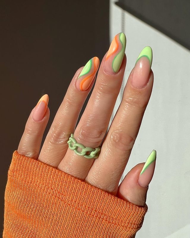 20 Latest Negative Space Nail Ideas To Try In 2024! 20 Negative Space Green And Orange Nails