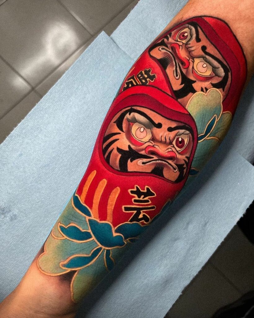 AMAZING DARUMA DOLL TATTOOS DESIGNS & MEANINGS - UPDATED FOR 2024 10 Daruma Doll Tattoo