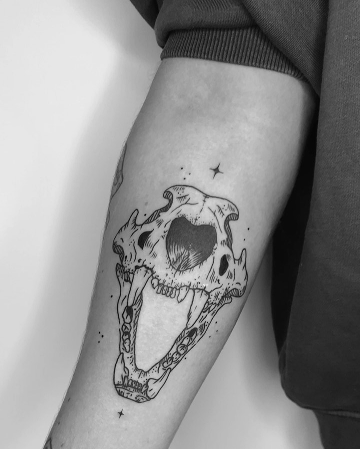 AMAZING ANIMAL SKULL TATTOO IDEAS AND THEIR MEANINGS IN 2024 19 Lion Skull Tattoo