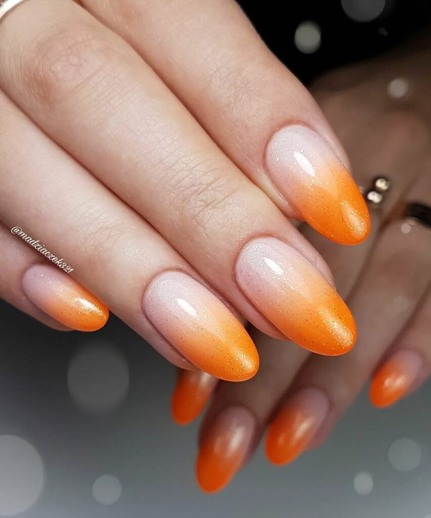 30 Latest Orange Ombre Nail Designs To Try In 2024! 14 Orange And White Ombre Nails With Tiny Glitters