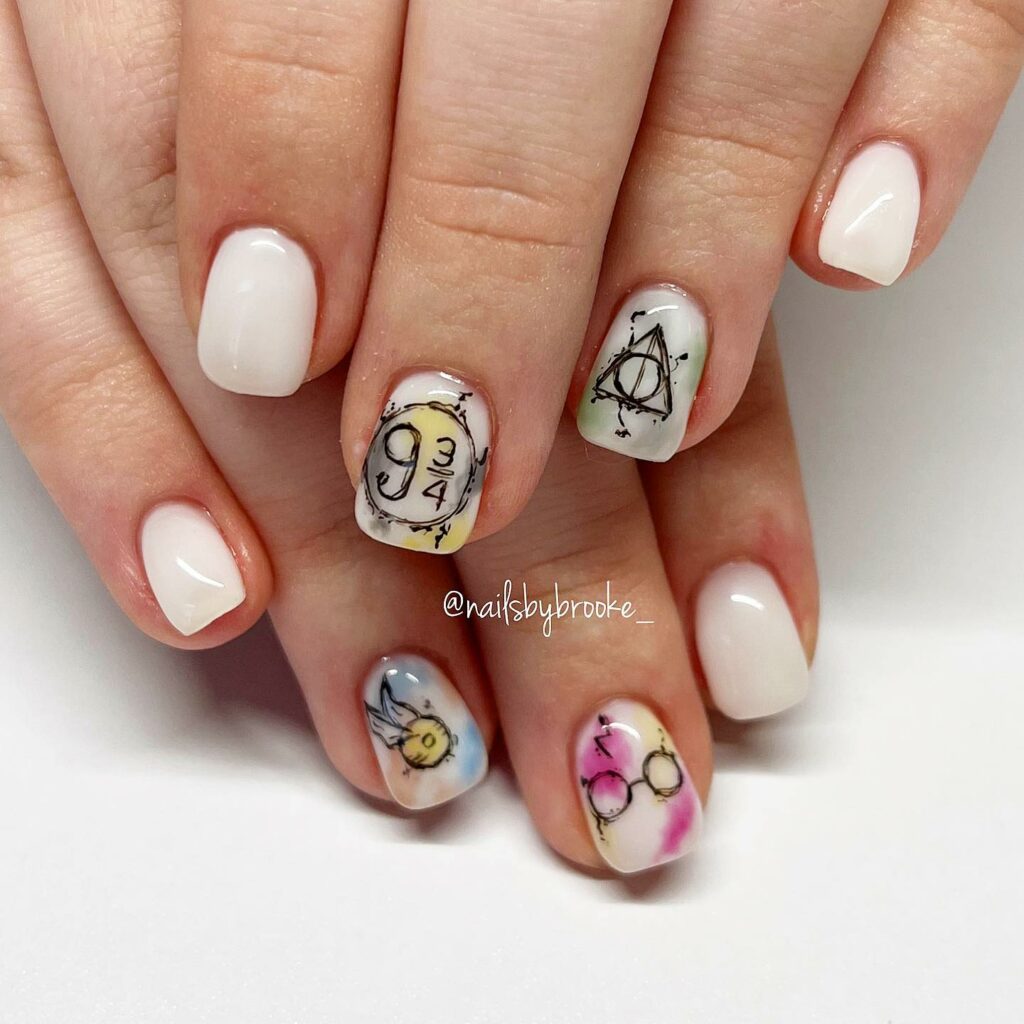 33 Latest Harry Potter Nail Ideas To Try In 2024! 24 Harry Potter Design On White Base Short Nails