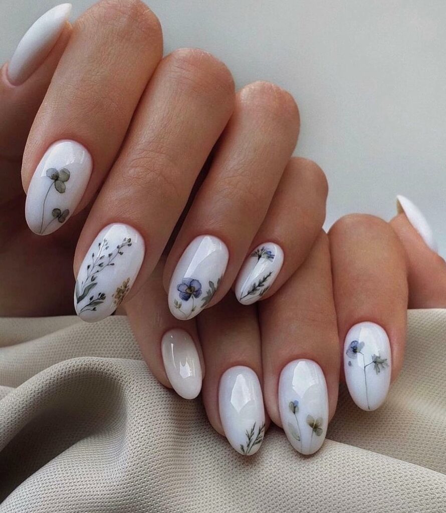 Attend in Style with 25 Wedding Guest Nail Designs in 2024 21 White Wedding Nails With Botanical Design