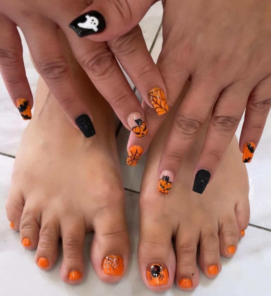 30 Spooky Halloween Pedicure Ideas to Try in 2024 29 A Sprinkle of Orange Glitter Magic