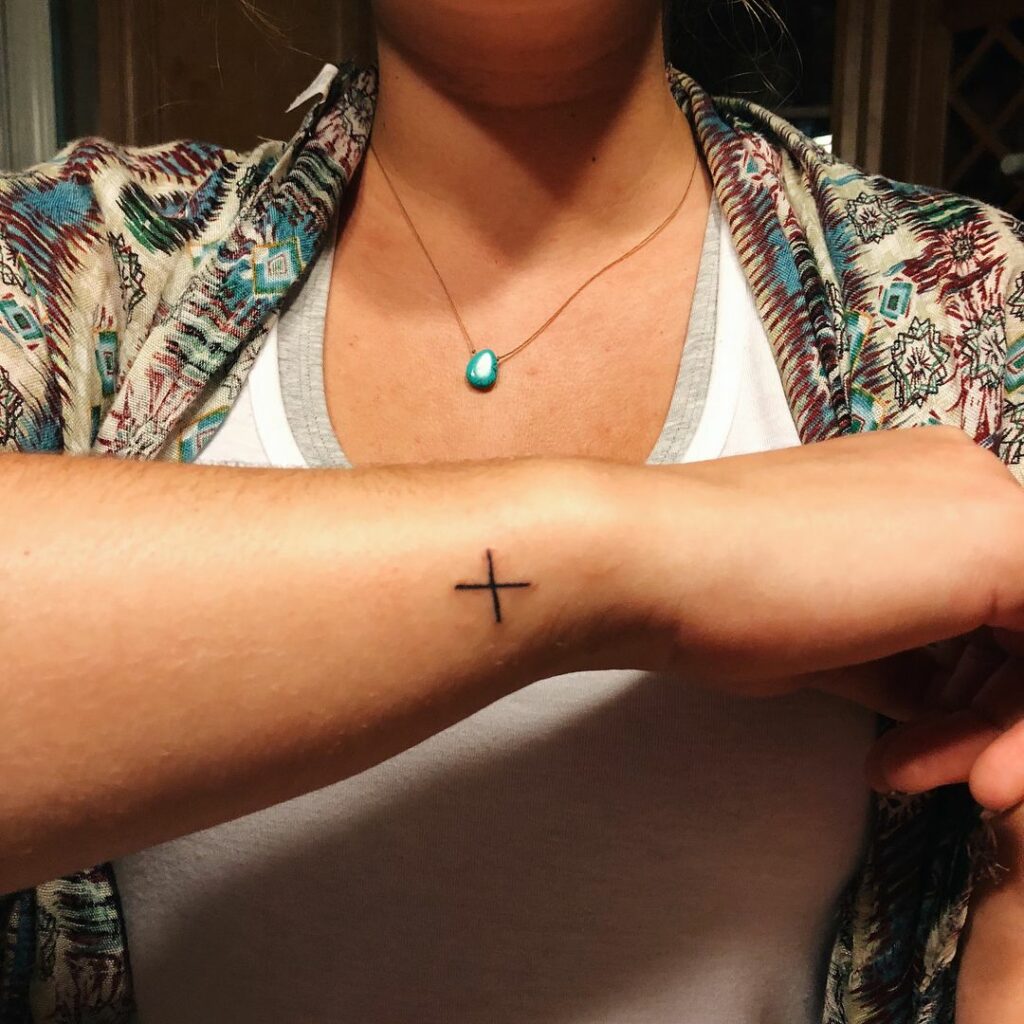 MATH AND GRAMMAR TATTOO DESIGNS & MEANINGS TO INSPIRE IN 2024 15 Plus Sign Tattoo