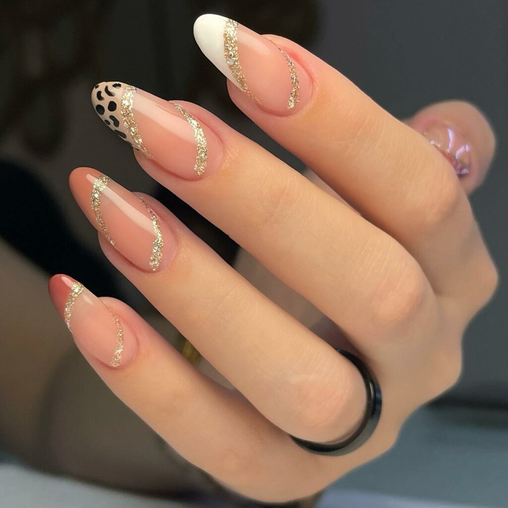25 Latest Leopard Print Nail Ideas To Try In 2024! 25 Leopard Tip With Gold Glitter Nails