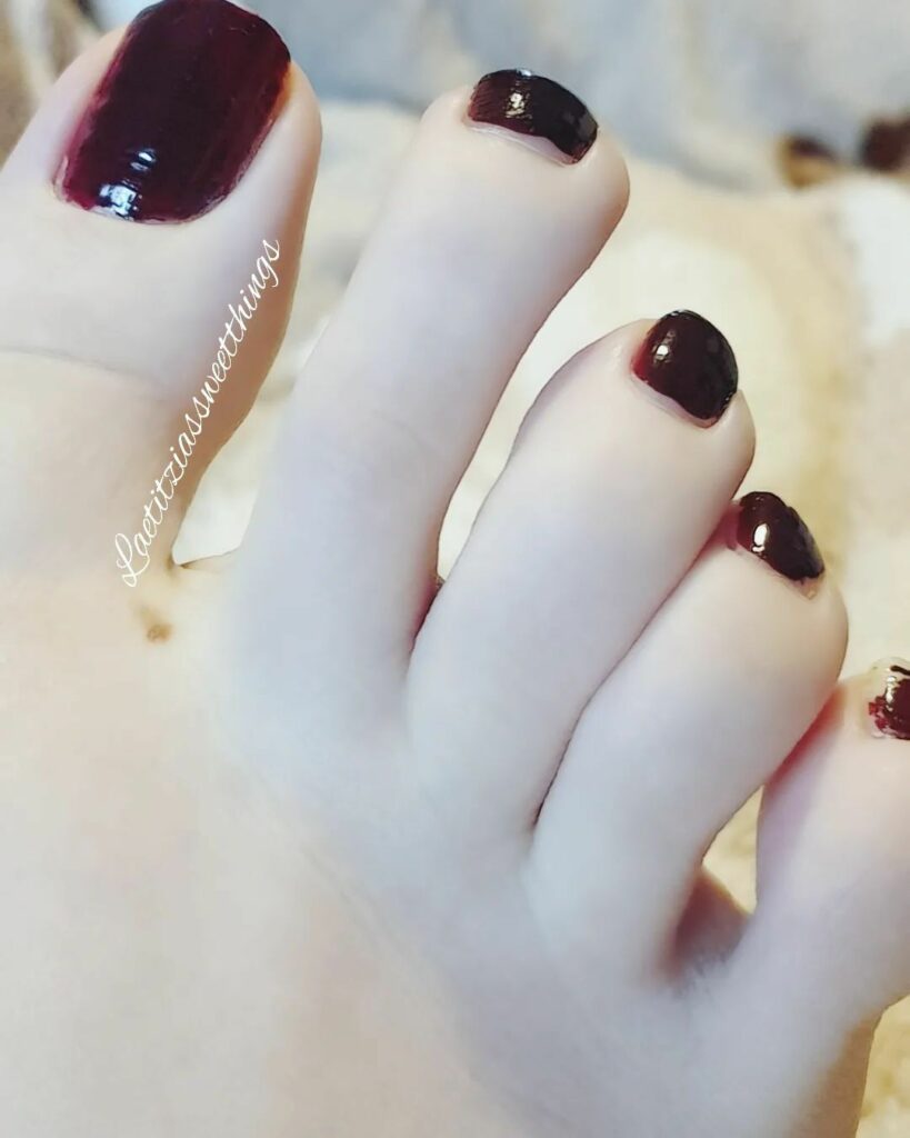 30 Spooky Halloween Pedicure Ideas to Try in 2024 11 Elegant Vampire-Red Toenails