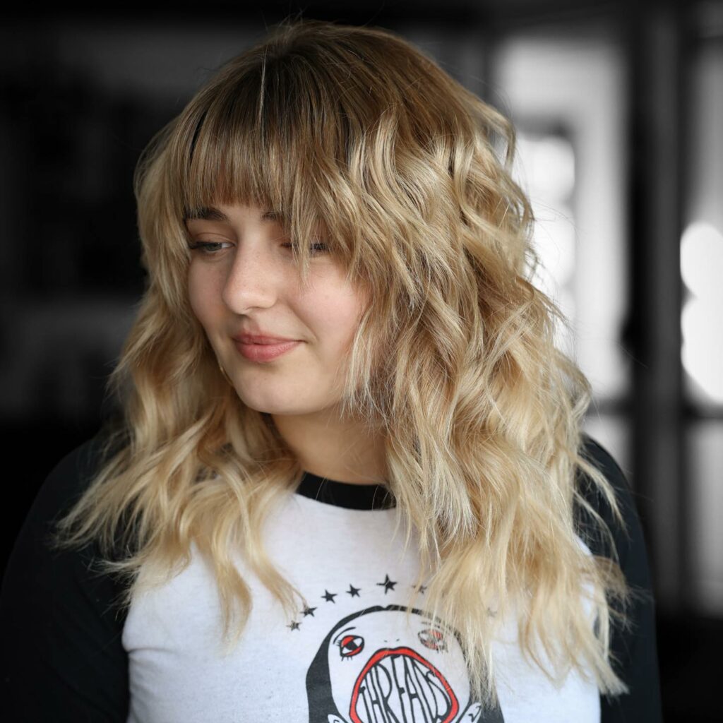 35 Long Wolf Cut Hairstyle Ideas to Try in 2024 27 Strawberry Blonde Wolfy Cut