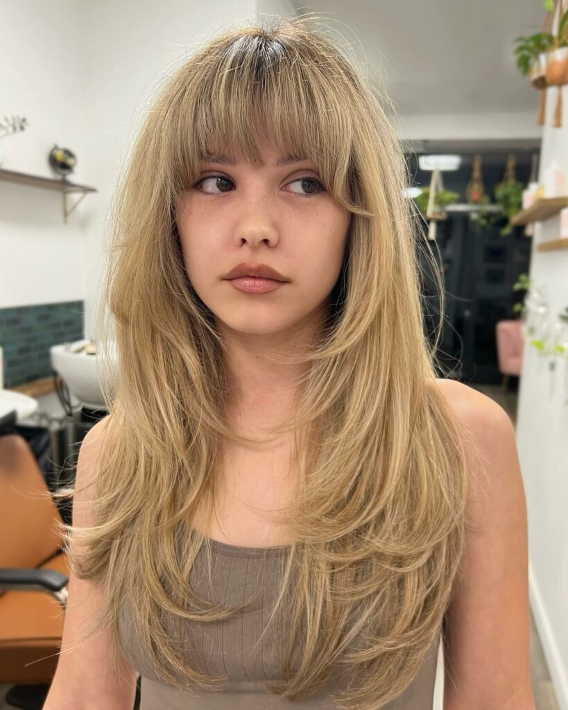 45 Wispy Long Curtain Bang Hairstyles to Try in 2024 35 Balayage & Feathery Elegance