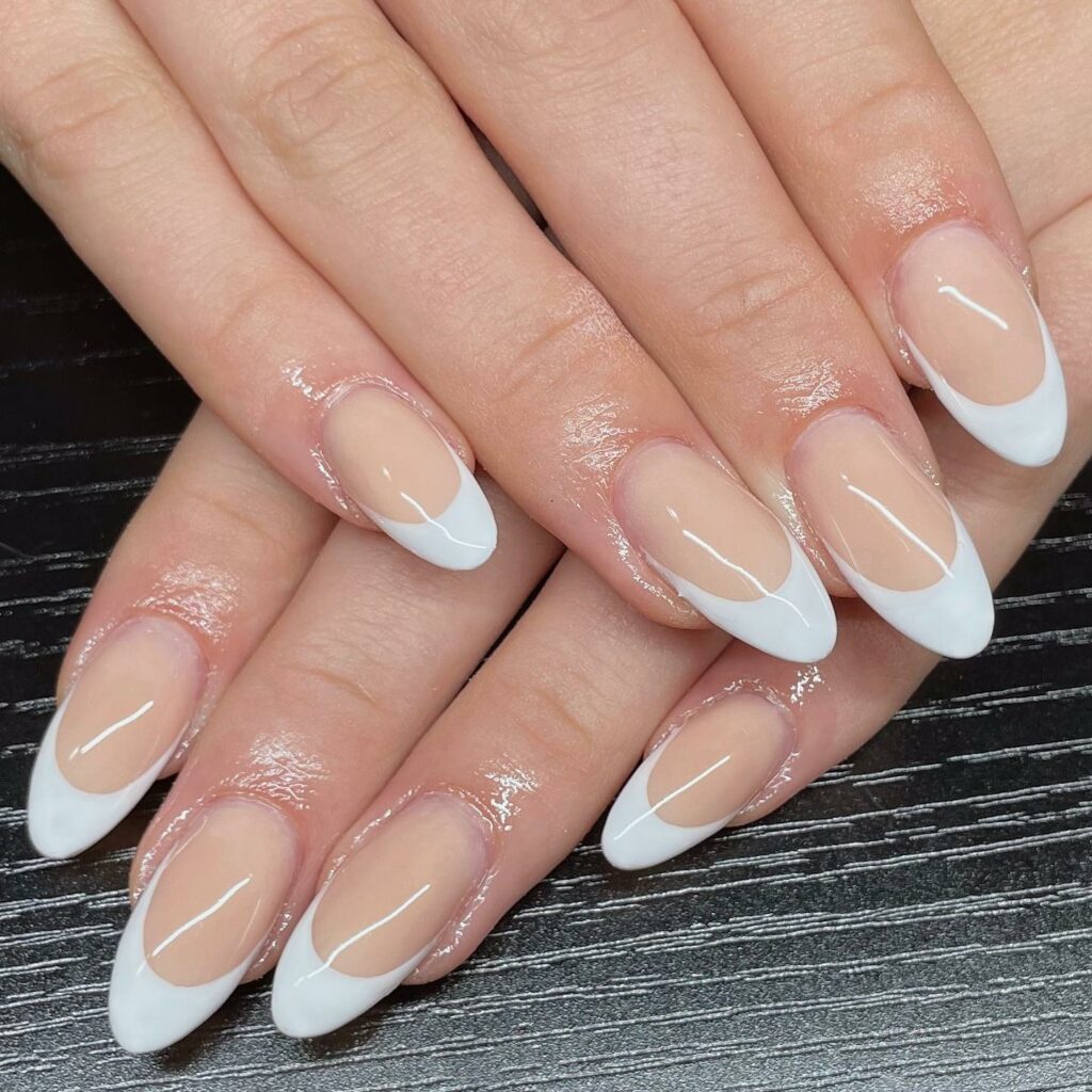 Find Your Style with 28 Beige Nail Designs of 2024 31 Classic French Manicure With Beige Polish