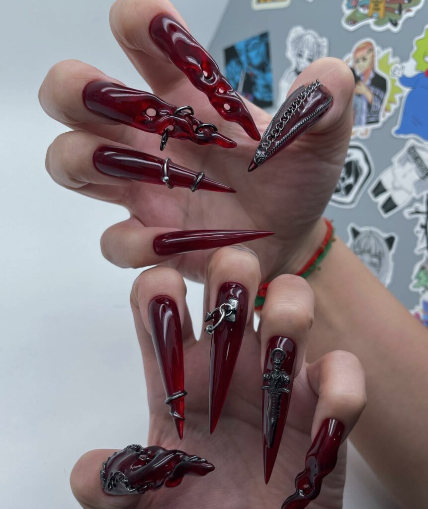 25 Latest Gothic Nail Ideas To Try In 2024! 24 Red Gothic Nails With Chain Design