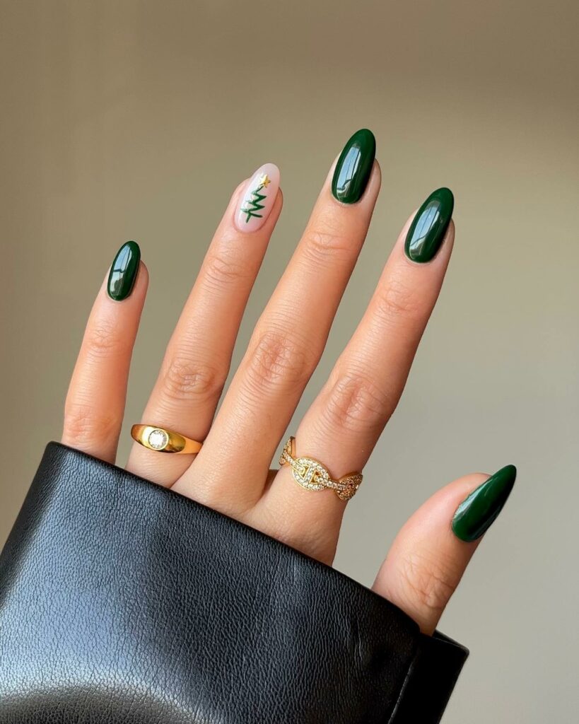 25 Latest Accent Nail Designs To Try In 2024! 11 Green Accent Nails With Christmas Tree Design