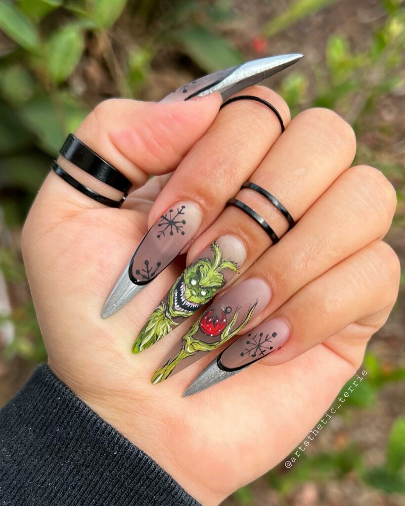 Embrace the Holiday Spirit in 2024 28 Halloween Grinch Nails on Stiletto Tips