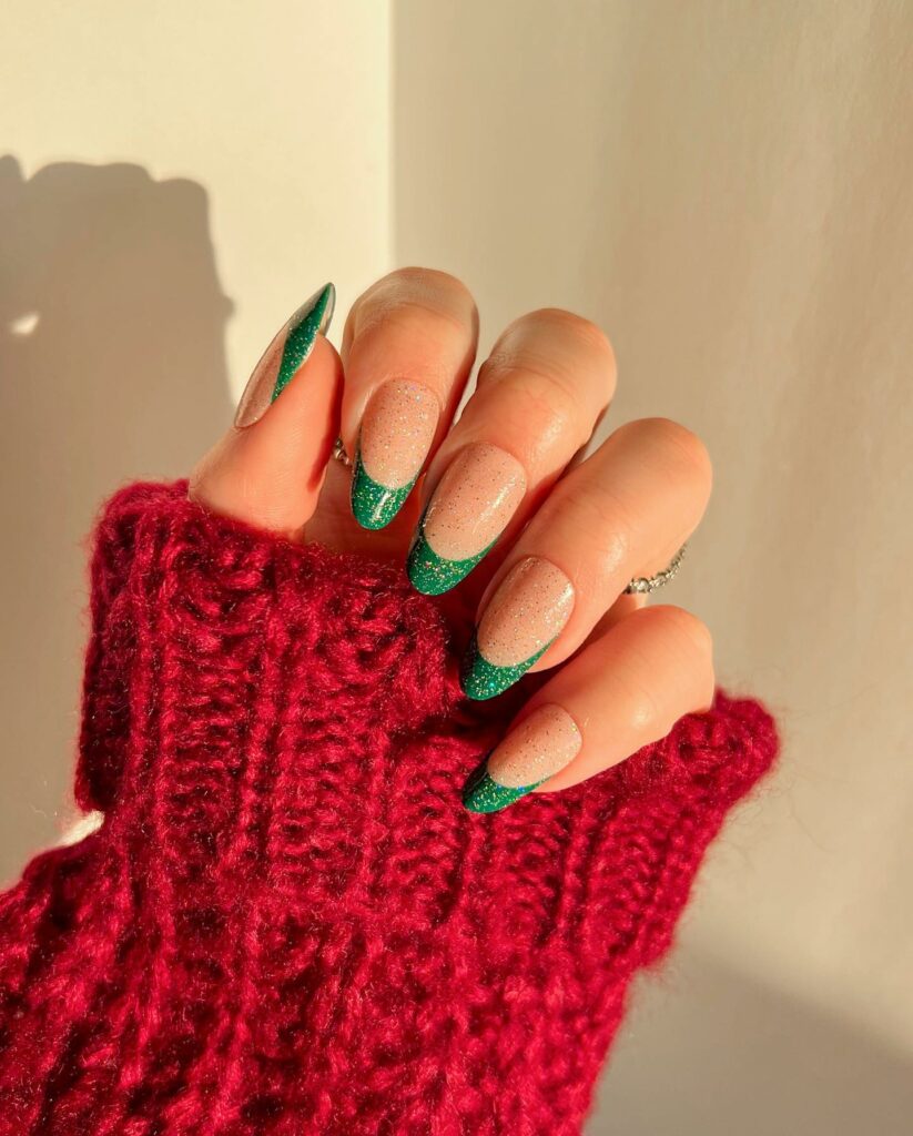 Celebrate with 40 Christmas Statement Nail Designs in 2024 13 Green French Tips With Gold Glitters Christmas Statement Nails