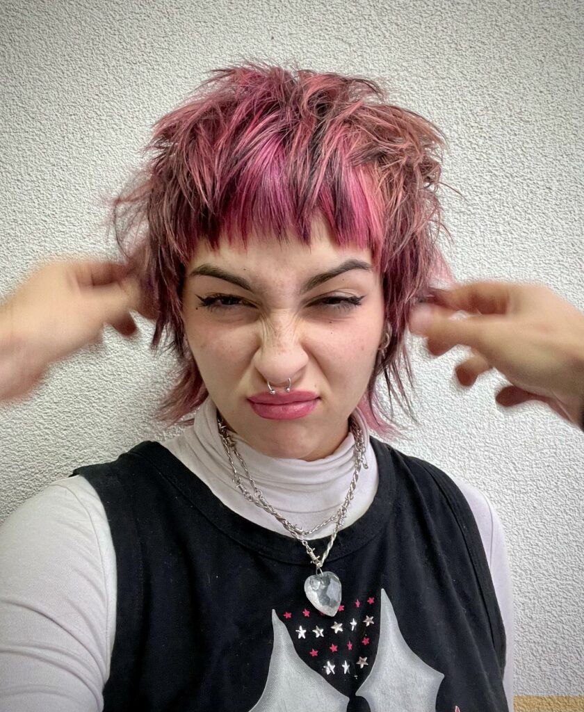 45 Pink Hairstyles to Add a Pop of Color to Your Look in 2024 34 Pink Bangs