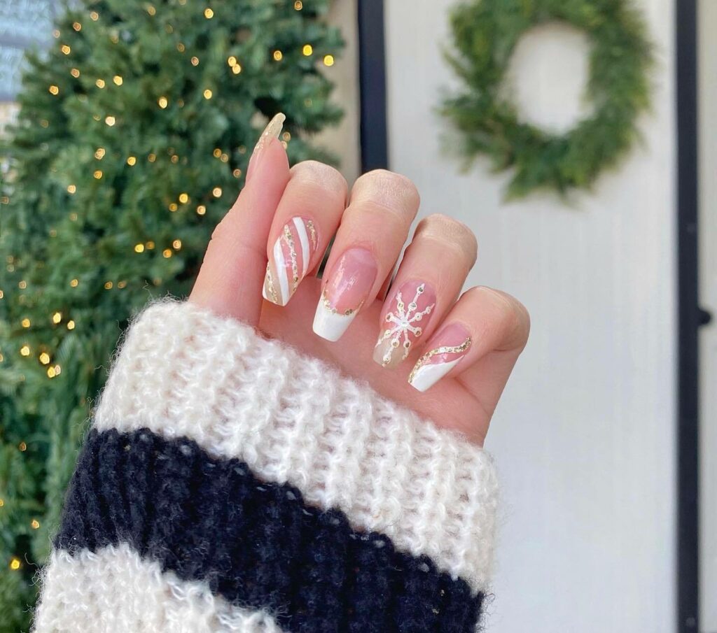 30 Latest Winter Nail Ideas To Try In 2024! 22 White Winter French Nails With Gold Glitters