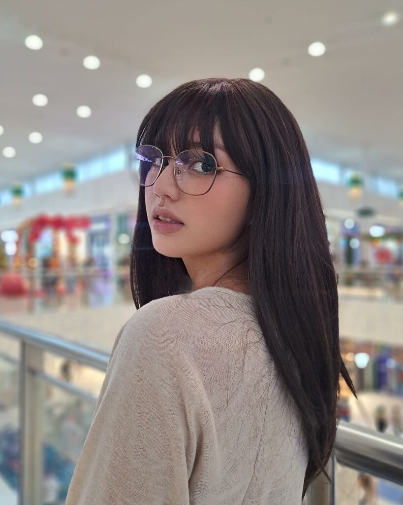 45 Wispy Long Curtain Bang Hairstyles to Try in 2024 49 Half-Moon Wispy Bangs