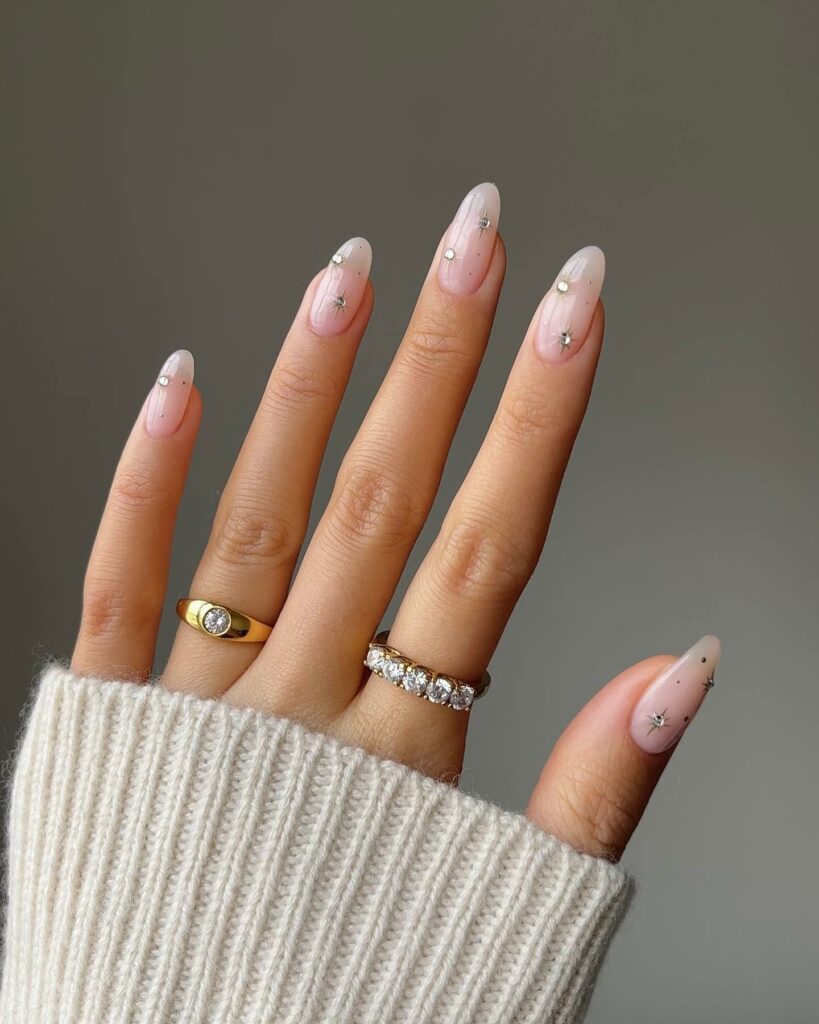 Glow with 20 Pearl White Nail Designs in 2024 27 White Pearl Nails With Silver Stars Design