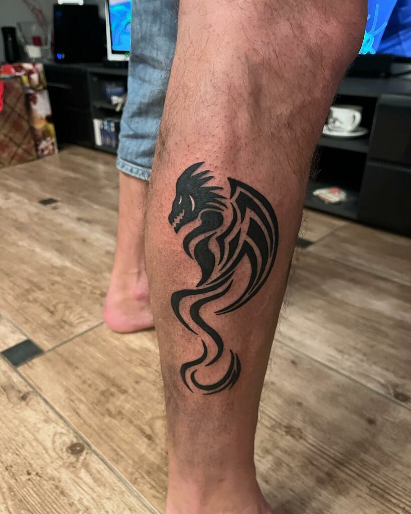 20+ BEST DRAGON TATTOO FOR MEN - UPDATED FOR 2024 16 Tribal Dragon Tattoo