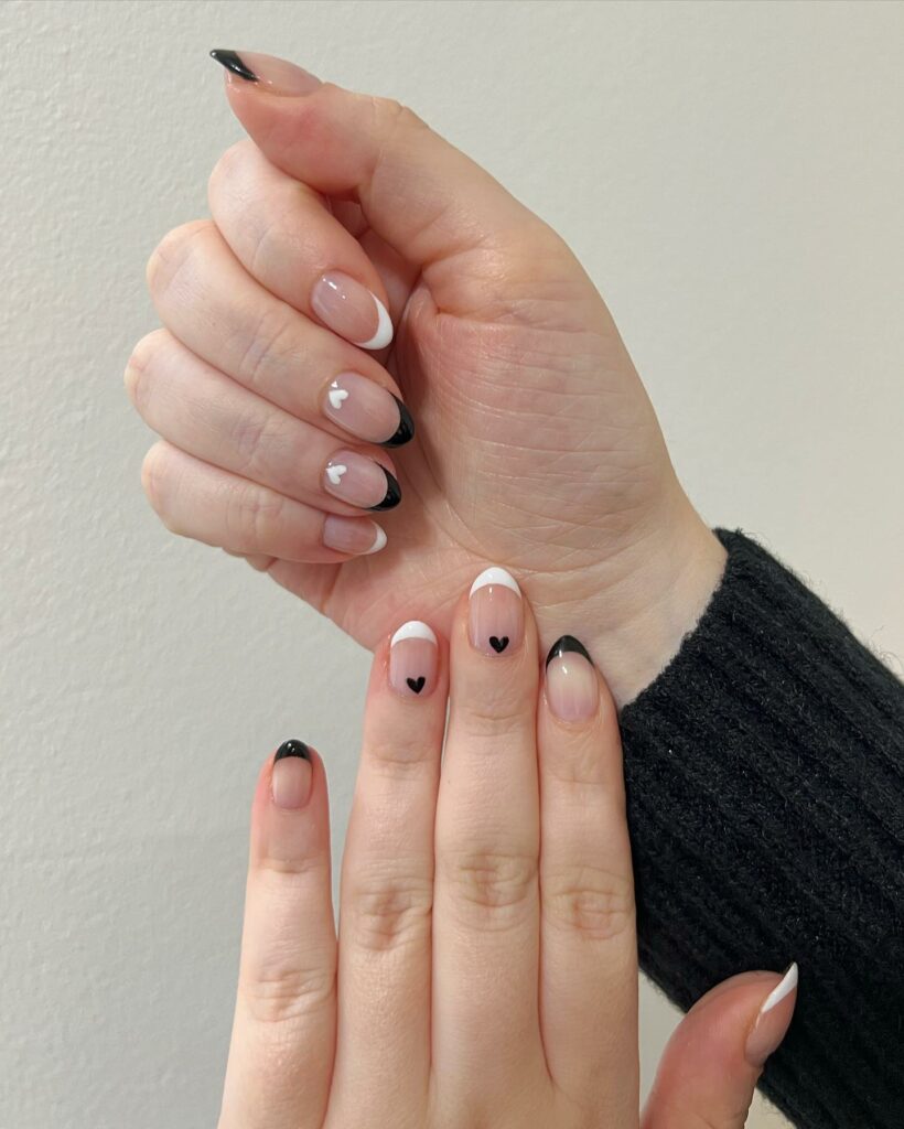 10 Latest Short Valentine's Nail Designs To Try In 2024! 15 Black And White Short Valentine French Nails With Heart