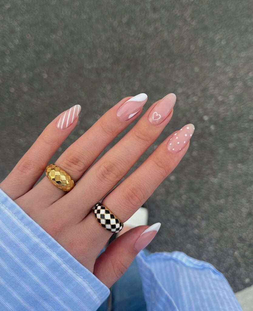 33 Latest Party Nail Ideas To Try In 2024! 23 White Abstract Party Nails With Heart And White Dots Design