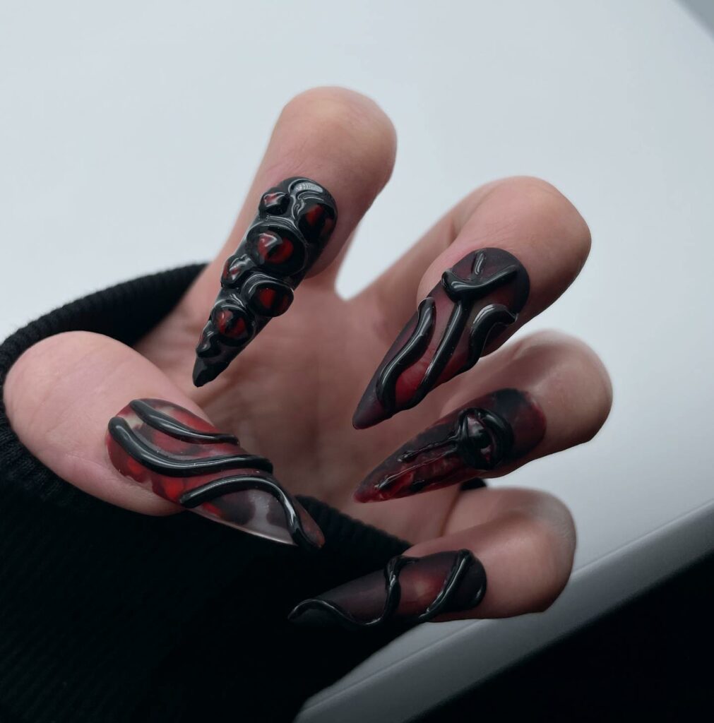 25 Latest Gothic Nail Ideas To Try In 2024! 19 Gothic Nails With 3D Black Swirl And Eyes Design