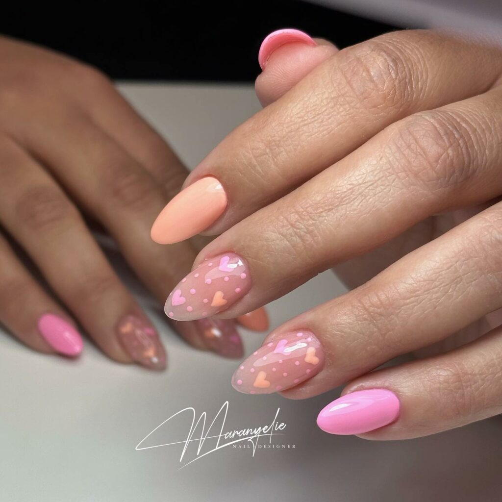 27 Romantic Nail Designs to Try for Valentine's Day 2024! 15 Sweet Harmony: Baby Pink and Orange Love