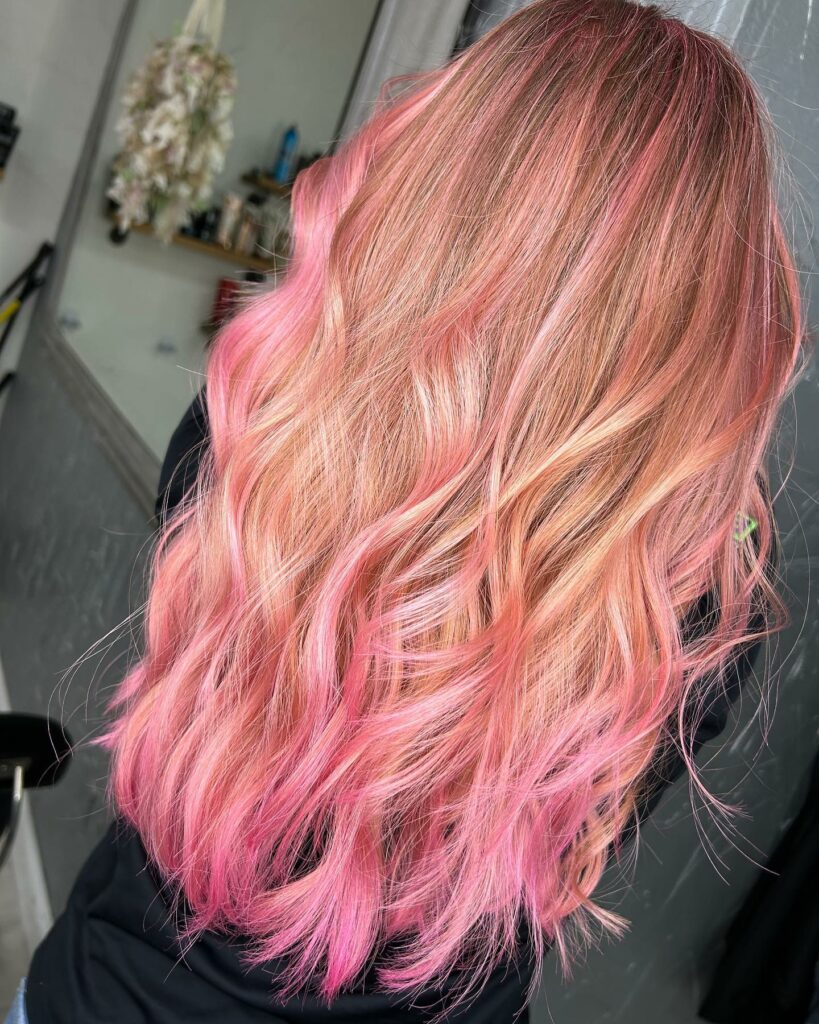 45 Pink Hairstyles to Add a Pop of Color to Your Look in 2024 19 Blonde Hair with Pink Highlights