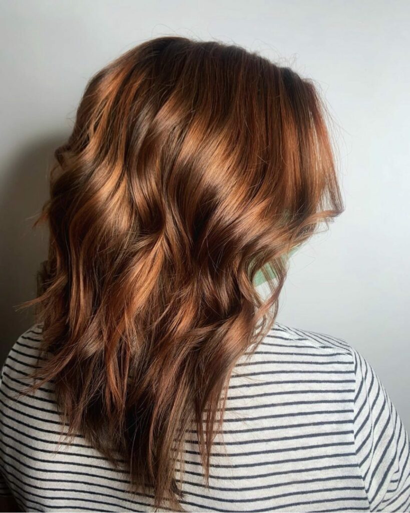 35 Dark Red Hair Ideas to Add Drama to Your Look in 2024 18 Natural Auburn with Highlights