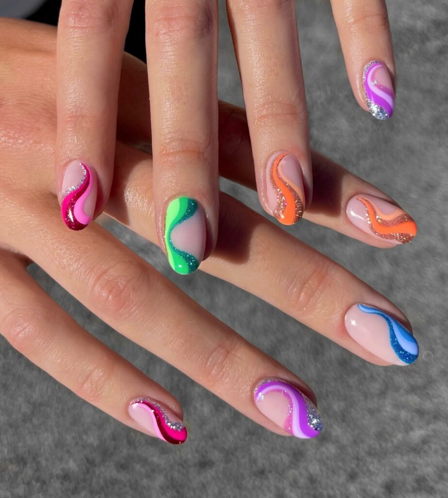 Get Swirly with 35 Swirl Nails Ideas for 2024 19 Rainbow Nails with Glitter Swirls