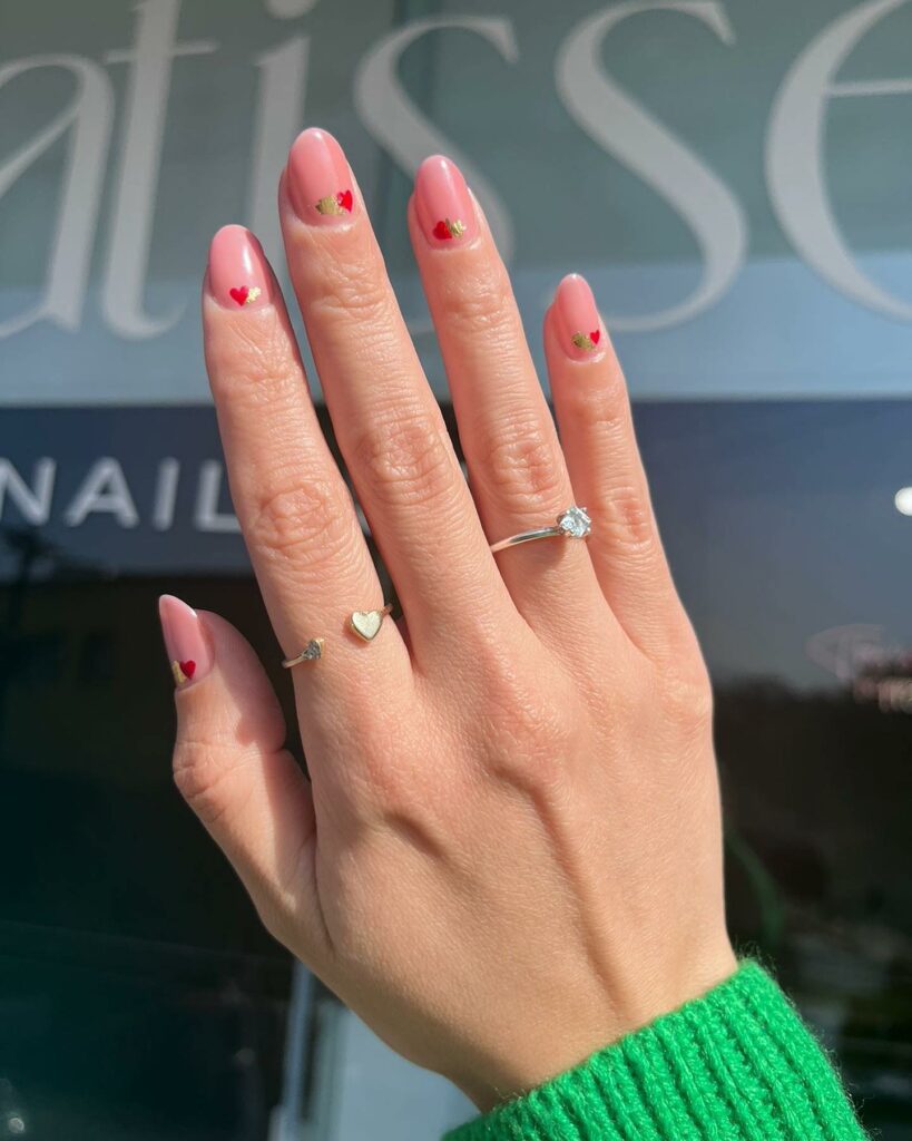 10 Latest Short Valentine's Nail Designs To Try In 2024! 14 Pink Short Valentine Nails With Tiny Heart And Gold Design