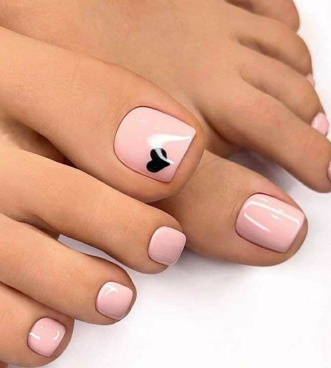 Get Playful with 30 Heart Toenail Pedicure Ideas for 2024 22 Black Heart Nail Art On Pastel Colored Pedicure