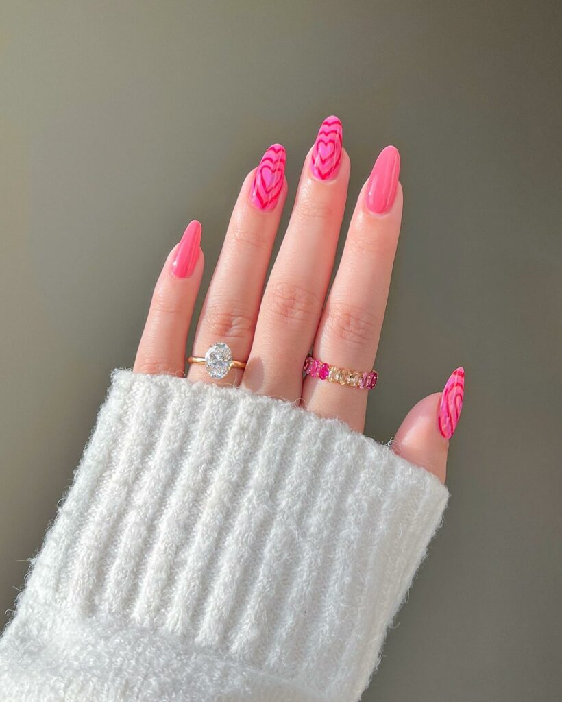 40 Latest Trendy Nail Ideas To Try In 2024! 19 Pink Almond Trendy Nails With Spiral Heart
