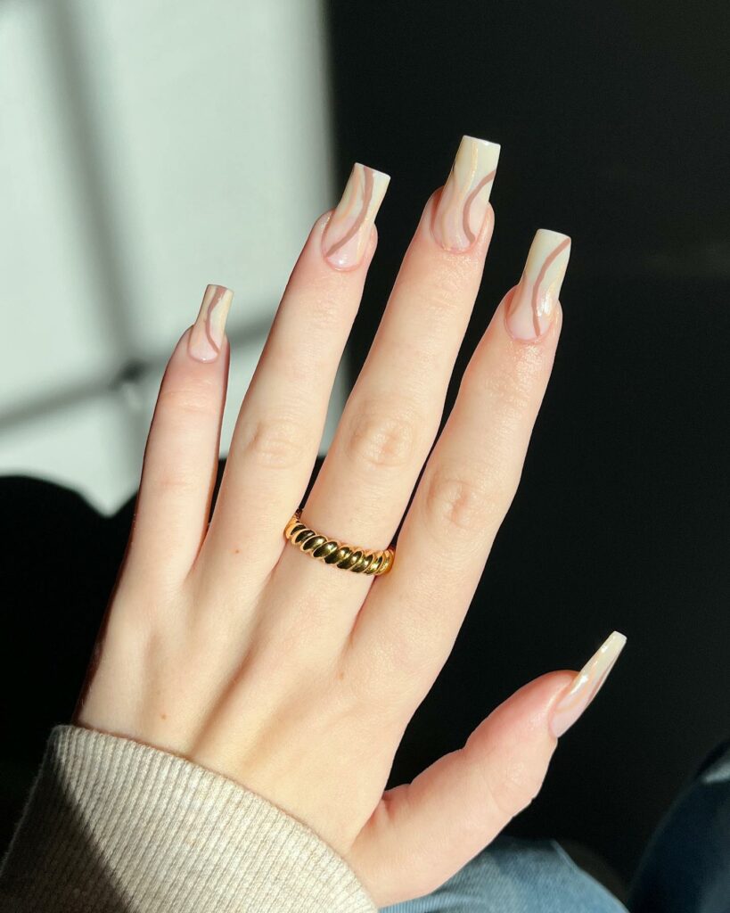 Get Swirly with 35 Swirl Nails Ideas for 2024 17 Almond Nails with Neutral Swirls