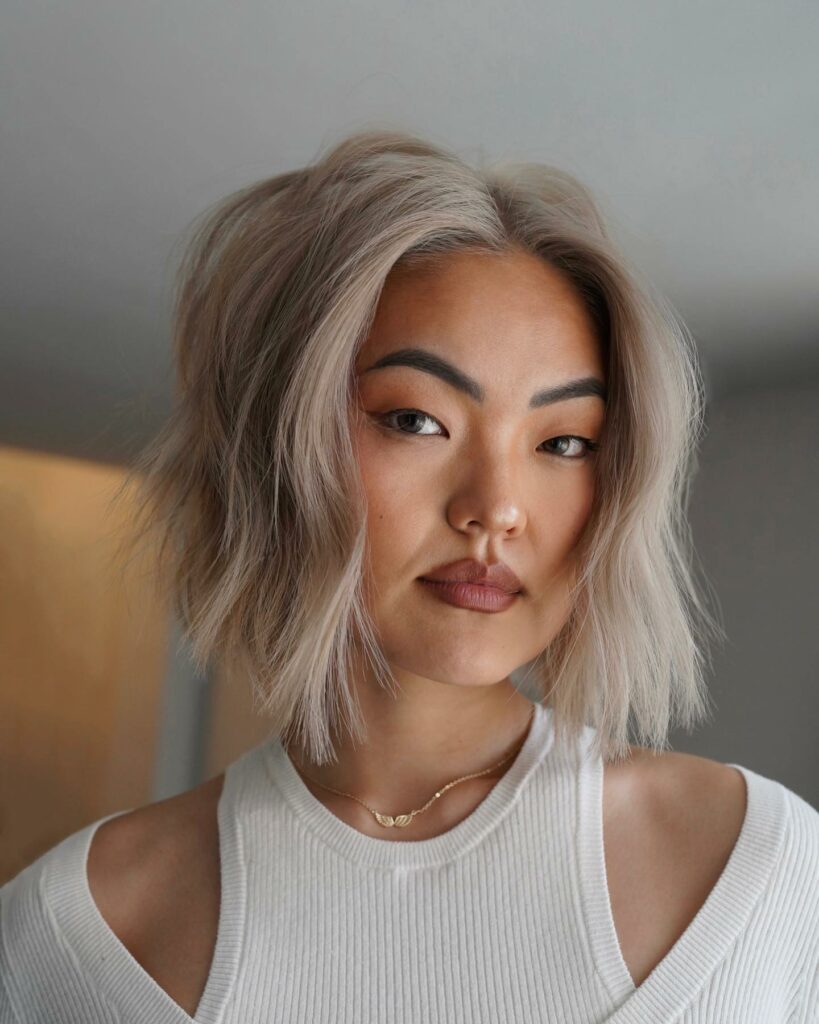 35 Face Framing Layers Ideas to Elevate Your Look in 2024 30 The Platinum Lob with a Twist