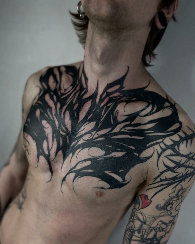Chest Tattoo Pain - How Bad Is It & How To Reduce It In 2024 12 Chest Tattoo