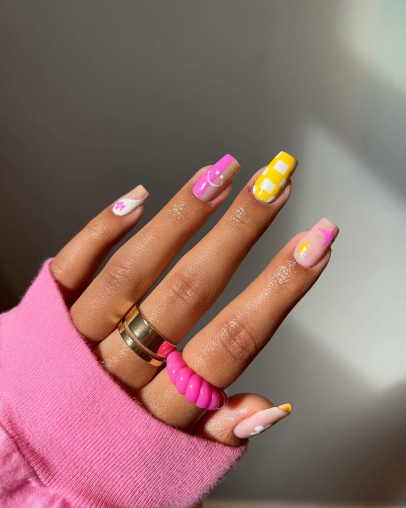 20 Latest Pink And Yellow Nail Ideas To Try In 2024! 10 Pink And Yellow Nails With Checkered And Emoji Design