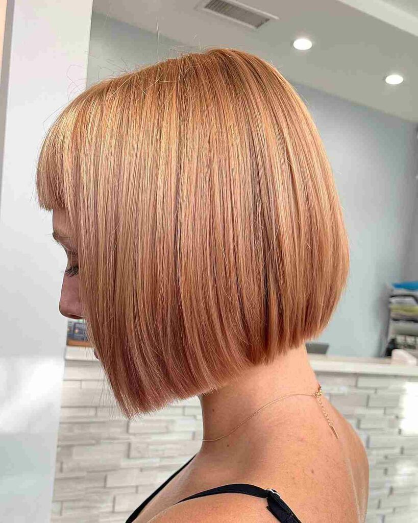 35 Strawberry Blonde Hair Ideas to Try in 2024 22 Blonde Bob with a Strawberry Twist