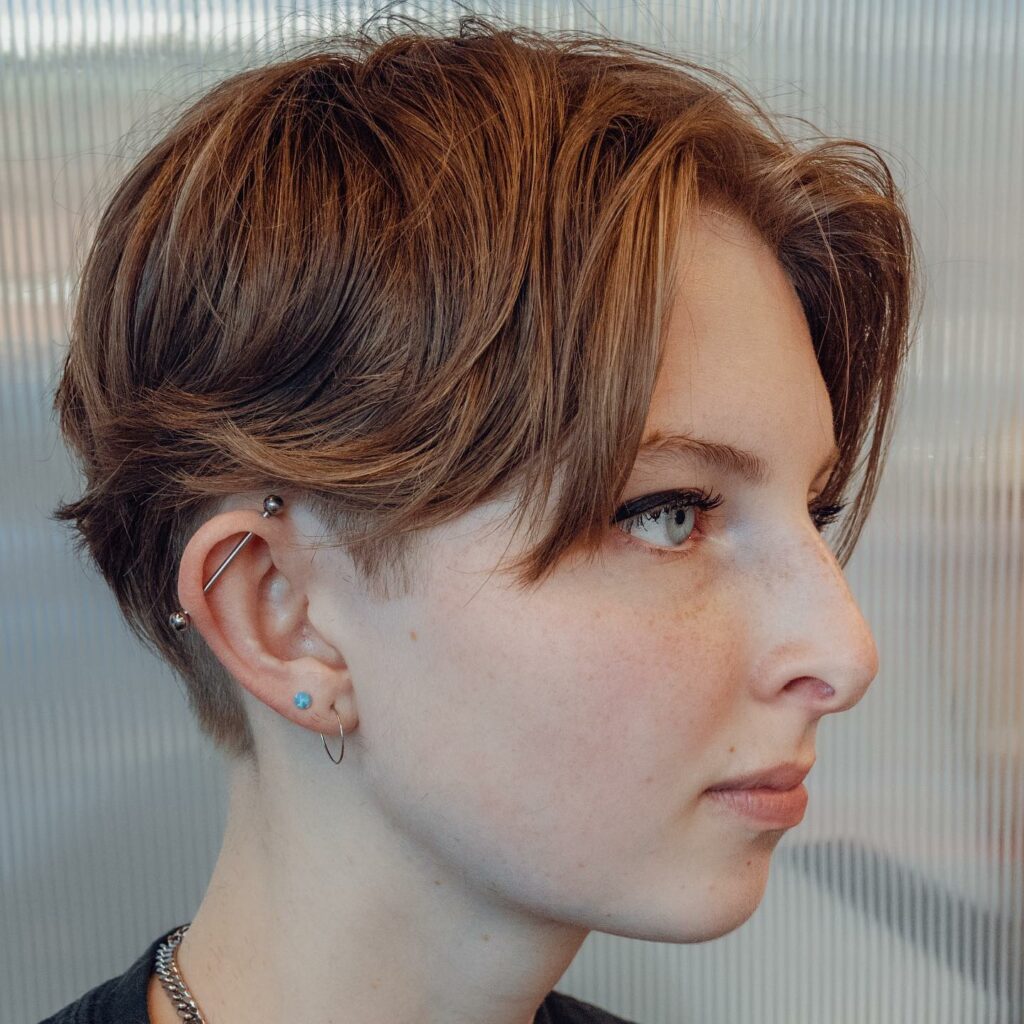 35 Short-Sided Shaved Female Hairstyles to Flaunt Your Boldness in 2024 14 Short Razor Cut Shag
