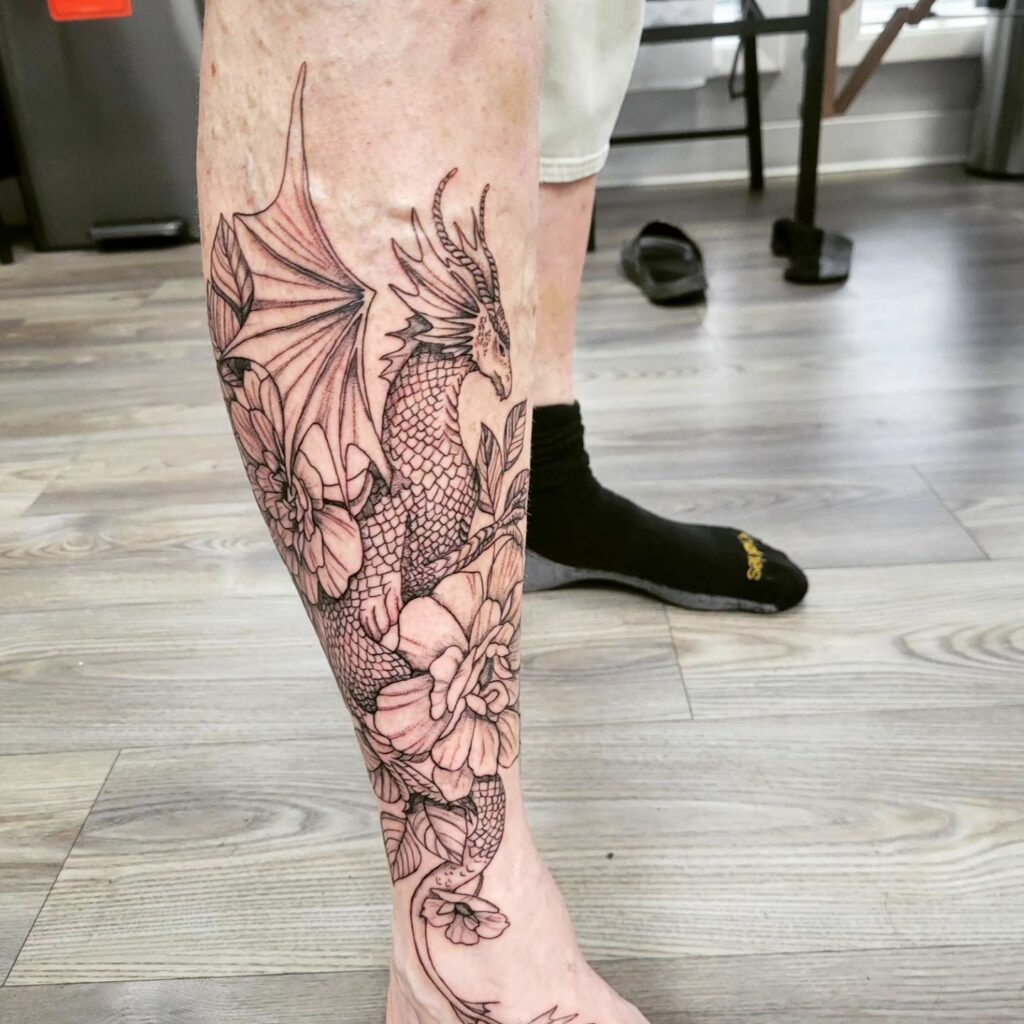 20+ BEST DRAGON TATTOO FOR MEN - UPDATED FOR 2024 28 Floral Dragon Tattoo