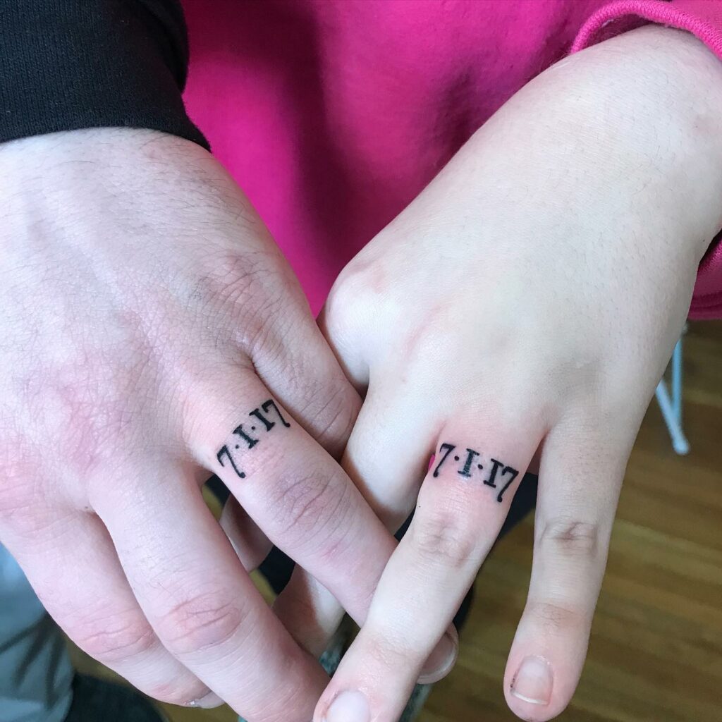 10 Best Wedding Ring Tattoo Ideas - Updated For 2024 16 Date Wedding Ring Finger Tattoo