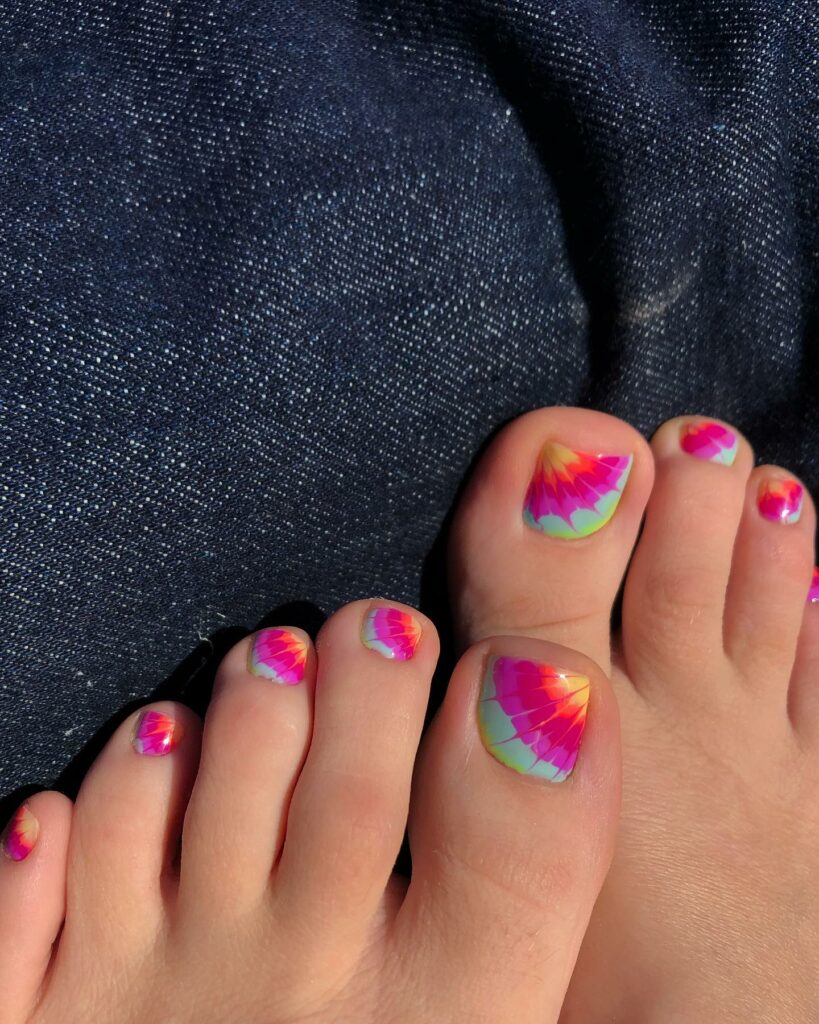 35 Rainbow Pedicure Ideas to Add Vibrancy to Your Look in 2024 30 TIE-DYE RAINBOW NAILS
