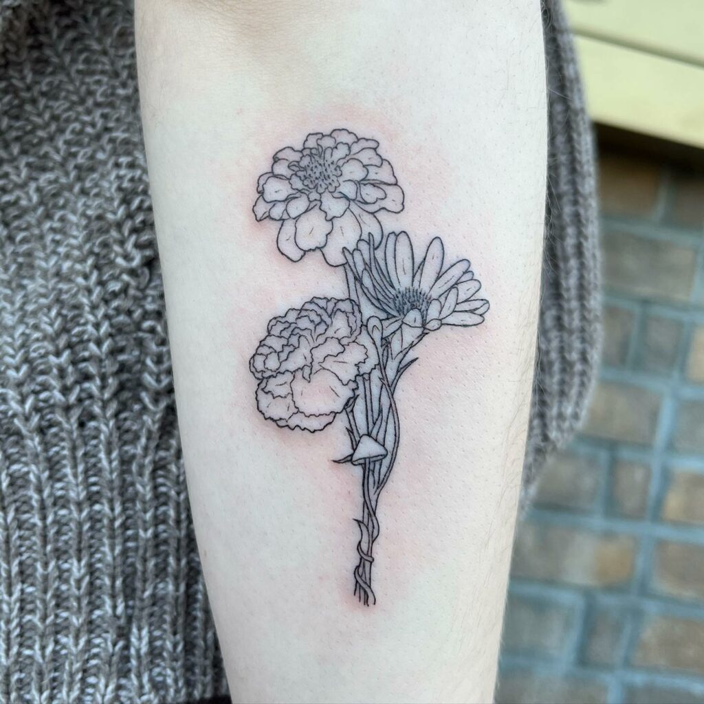 AMAZING MARIGOLD TATTOO DESIGNS & MEANINGS TO INSPIRE YOU IN 2024 26 Daffodil and Marigold Tattoo