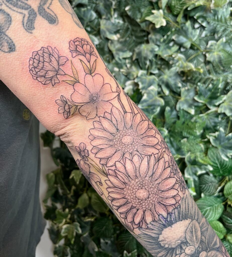 AMAZING MARIGOLD TATTOO DESIGNS & MEANINGS TO INSPIRE YOU IN 2024 24 Tulip and Marigold Tattoo