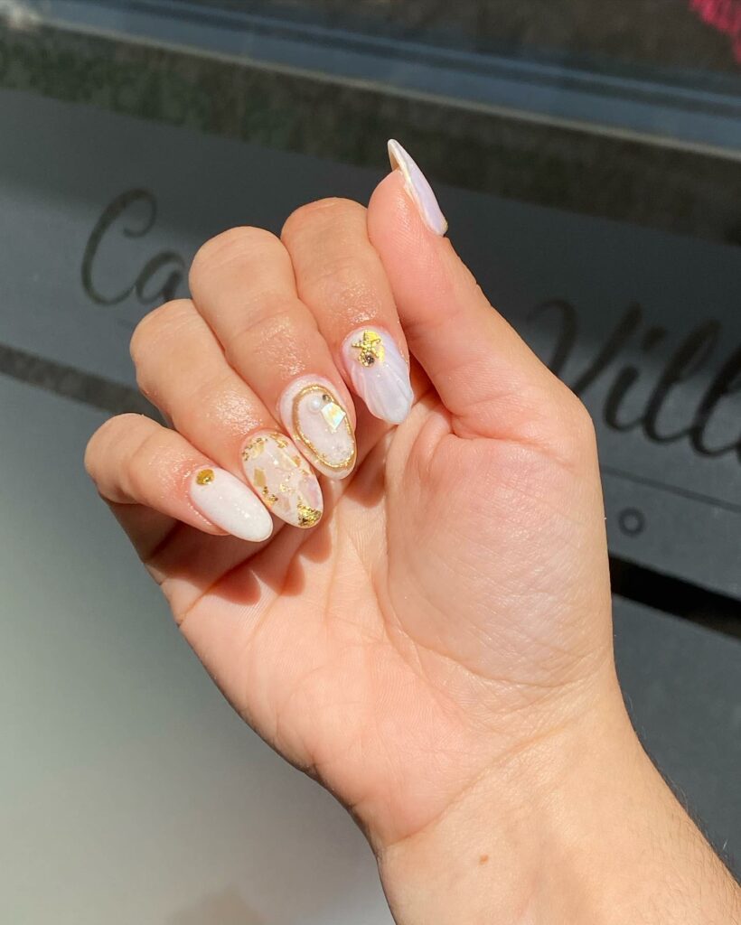 30 Latest White And Gold Nail Ideas To Try In 2024! 44 Mermaid Inspired White And Gold Nails